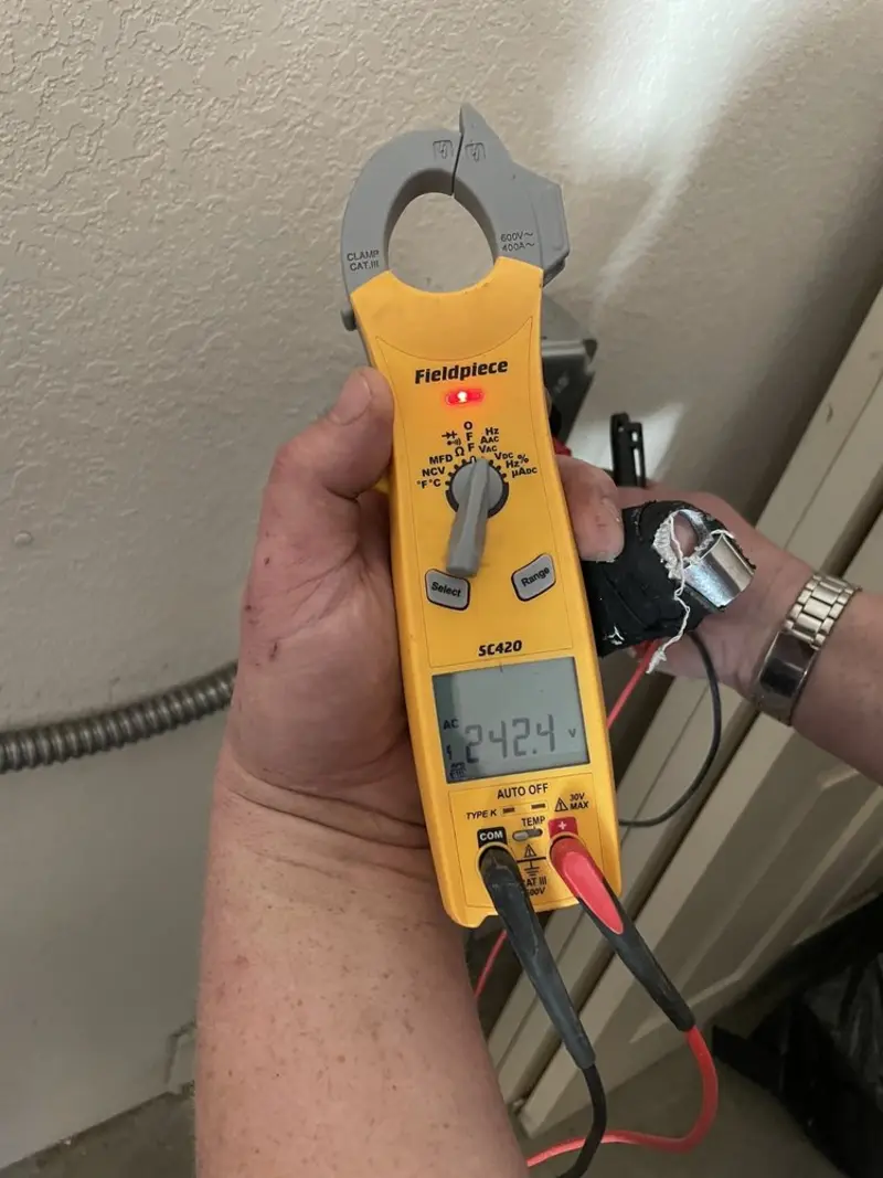 Voltage testing with clamp meter during Recessed Lighting Installation in Flowery Branch